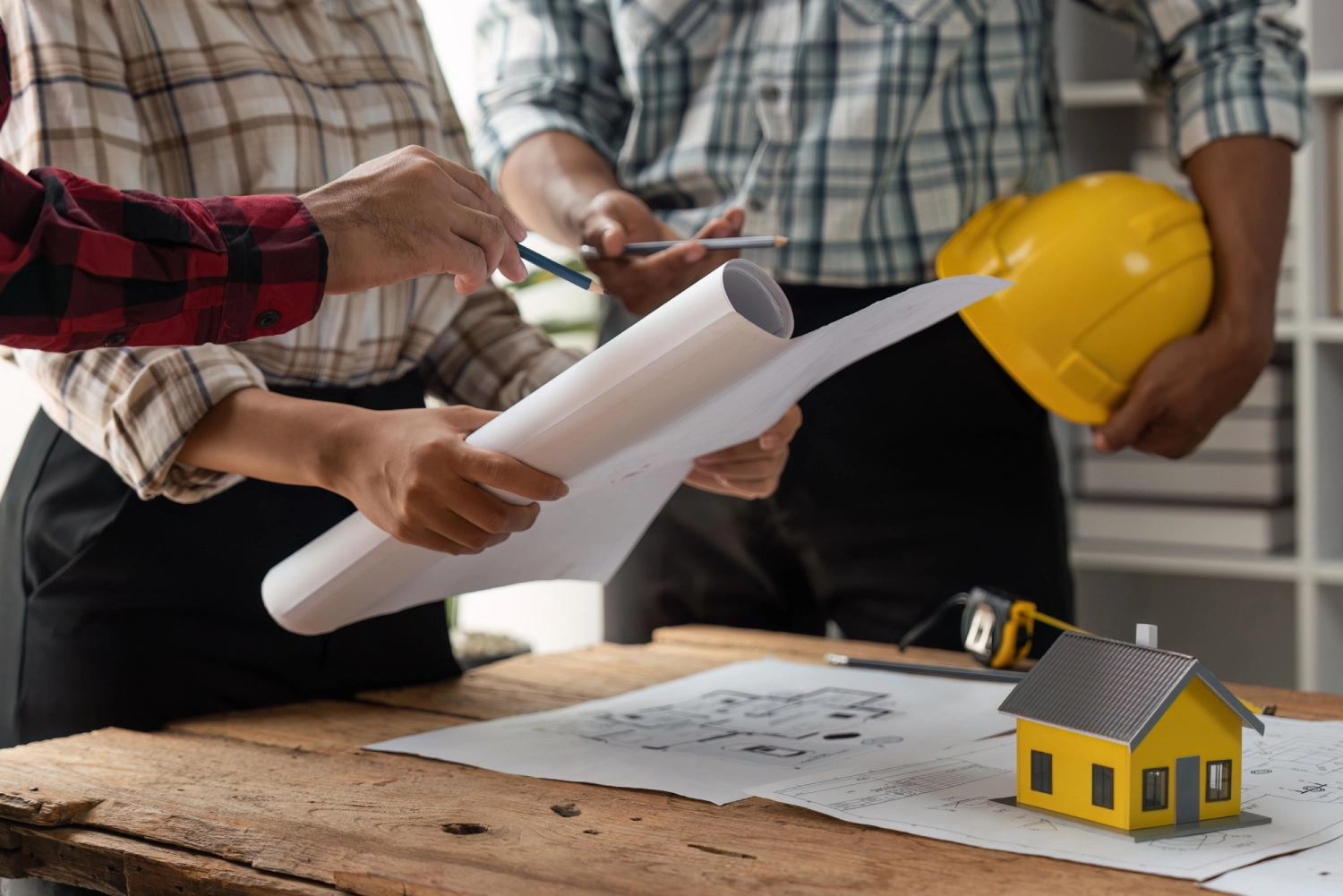 engineer working in office with blueprints, inspection in workplace for architectural plan, construction project ,Business construction<br />